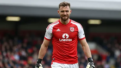 Wrexham A.F.C. denied Welsh derby win at Cardiff City Stadium, with Rubin Colwill equalizing in the 98th minute