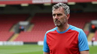 Wrexham A.F.C. legend Paul Mullin leaves for Rotherham, ex-star backs Kieffer Moore for Premier League promotion