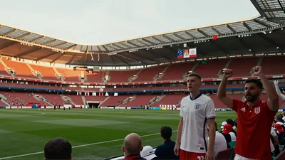 Fans roar against England caps in Wrexham A.F.C. shop